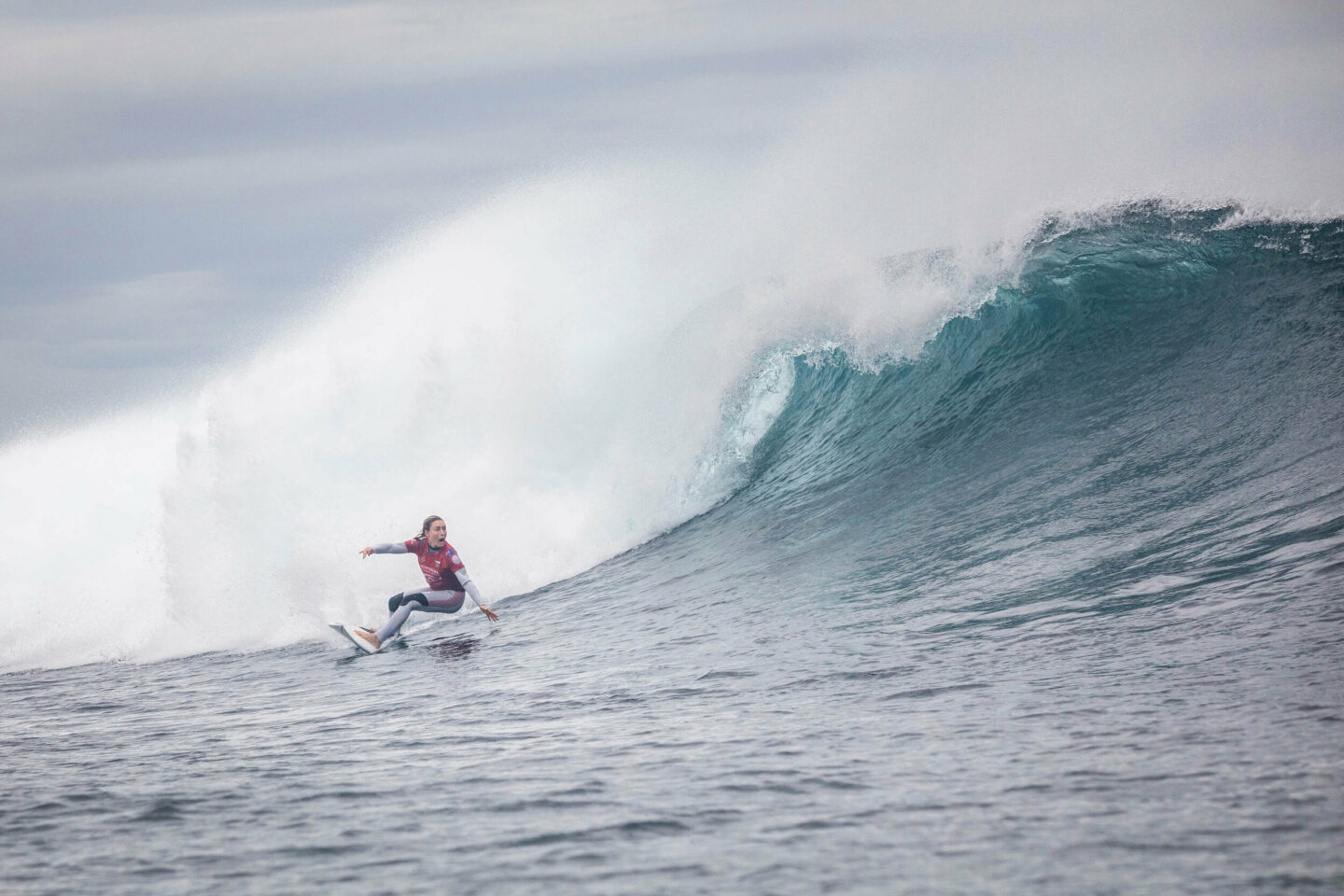 Nikki van Dijk riding a big surfboard in big waves